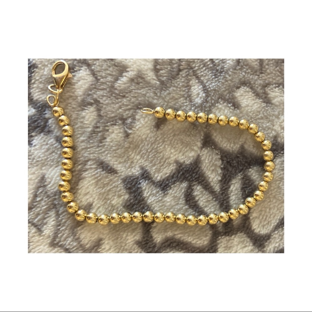 Solid gold beaded clasp bracelet